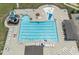 A community playground with slides and swings for children, adjacent to a picnic shelter and a tennis court at 145 Meadow Branch Ln, Dallas, GA 30157