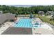 Community pool features a large swimming area, kiddie pool, lounge chairs and nearby covered picnic area at 145 Meadow Branch Ln, Dallas, GA 30157