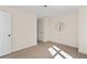 Bright bedroom with neutral carpet and light walls at 1880 Eastfield St, Decatur, GA 30032