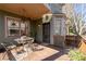 Charming porch area with outdoor seating, plants, and a view of the yard at 1880 Eastfield St, Decatur, GA 30032