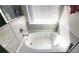 Modern tub with tile surround and window at 7157 Gladstone Cir, Stonecrest, GA 30038