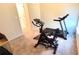 Exercise room with a weight machine, treadmill, and stationary bike at 7157 Gladstone Cir, Stonecrest, GA 30038