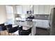 Stylish kitchen featuring a center island, stainless steel appliances, and ample counter space at 7157 Gladstone Cir, Stonecrest, GA 30038