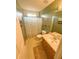 Bathroom featuring a single sink vanity, tile floor, and a shower with a patterned curtain at 226 Saul Dr, Ellenwood, GA 30294