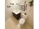 Cozy half-bathroom with decorative wall hangings and vinyl tile flooring at 226 Saul Dr, Ellenwood, GA 30294