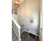 Foyer with hexagon tile floors, stairs, and a quaint seating area at 226 Saul Dr, Ellenwood, GA 30294