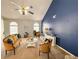 Spacious living room with vaulted ceilings, arched windows, and stylish seating arrangement and decor at 226 Saul Dr, Ellenwood, GA 30294