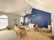 Airy living room with vaulted ceiling, bright windows and refined furniture arrangement at 226 Saul Dr, Ellenwood, GA 30294