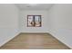 Clean bedroom with new flooring, fresh paint, and natural light at 4391 Shiloh Hills Dr, Snellville, GA 30039