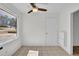 Bright breakfast nook with window view and neutral tile flooring at 4391 Shiloh Hills Dr, Snellville, GA 30039