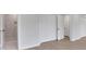 Bright bedroom with ample closet space and wood floors, creating a clean and modern feel at 8 Pine Canyon Sw Dr, Atlanta, GA 30331