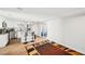 Open concept kitchen with stainless appliances, an island, and a slider door at 8 Pine Canyon Sw Dr, Atlanta, GA 30331