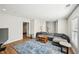 Bright living room with hardwood floors, neutral paint, and comfortable furniture at 8 Pine Canyon Sw Dr, Atlanta, GA 30331