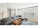 Comfortable living room with a cozy sectional sofa and natural light at 8 Pine Canyon Sw Dr, Atlanta, GA 30331