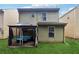 View of backyard with a gazebo and outdoor seating area at 1042 Wedgewood Ct, Conyers, GA 30012
