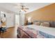 The main bedroom features a king bed, an ensuite bathroom, and a spacious layout at 1042 Wedgewood Ct, Conyers, GA 30012