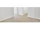 Bright hallway with white walls and light wood floors at 5769 Tillman Way, Powder Springs, GA 30127