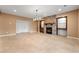 Finished basement with tile flooring, a stone fireplace, and built-in shelving at 30 Crolley Ln, White, GA 30184