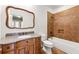 Charming bathroom with custom vanity, granite countertop, and tiled shower at 30 Crolley Ln, White, GA 30184