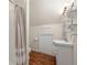 Clean bathroom with a shower, pedestal sink, and decorative shelves at 30 Crolley Ln, White, GA 30184