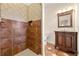 Bathroom featuring a custom vanity with marble countertop, tile shower, and designer finishes at 30 Crolley Ln, White, GA 30184