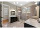 Beautiful bathroom featuring double sinks, marble countertop, tiled floors, and a glass-enclosed shower at 30 Crolley Ln, White, GA 30184