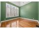 Well-lit bedroom featuring shuttered windows and ample space, perfect for relaxation and comfort at 30 Crolley Ln, White, GA 30184