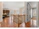 Open foyer with railing and access to the kitchen area at 30 Crolley Ln, White, GA 30184