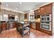 Well-equipped kitchen with stainless steel appliances, granite countertops, and ample cabinet space at 30 Crolley Ln, White, GA 30184