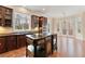 Spacious kitchen with a center island, granite countertops, and stainless steel appliances at 30 Crolley Ln, White, GA 30184