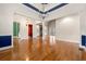 Spacious living room with hardwood floors, stone fireplace, and ample natural light at 30 Crolley Ln, White, GA 30184