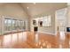 Bright living room with hardwood floors, vaulted ceilings, and access to a patio at 30 Crolley Ln, White, GA 30184