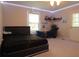 Stylish bedroom with a large bed, accent lighting, and comfortable seating at 132 Hammond Dr, Canton, GA 30114
