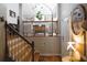 Inviting foyer with hardwood floors, a staircase, and an open view into the adjacent living space at 132 Hammond Dr, Canton, GA 30114