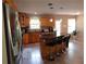 Updated kitchen with stainless steel appliances, granite countertops, and large island with seating at 132 Hammond Dr, Canton, GA 30114