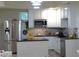 Modern kitchen featuring stainless steel appliances, granite countertops, and white cabinetry at 132 Hammond Dr, Canton, GA 30114