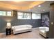 Cozy living room featuring a comfortable white couch, accent chair, and well lit windows at 132 Hammond Dr, Canton, GA 30114