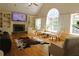 Spacious living room with vaulted ceilings, fireplace, and built-in shelves for a cozy atmosphere at 132 Hammond Dr, Canton, GA 30114