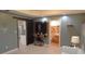 Living room features a sliding barn door, TV, and a view of the bathroom at 132 Hammond Dr, Canton, GA 30114
