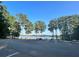 Plenty of parking with lake view at the community center at 132 Hammond Dr, Canton, GA 30114