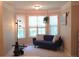 Cozy sitting area with natural light, comfortable furniture, and a view of the outdoors at 132 Hammond Dr, Canton, GA 30114