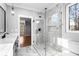 Elegant bathroom with marble floors, marble shower, and double sink vanity at 1798 Braselton Hwy, Lawrenceville, GA 30043