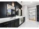 Contemporary bathroom boasting marble floors, double vanity, gold hardware, and large mirrors at 1798 Braselton Hwy, Lawrenceville, GA 30043