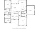 Detailed floor plan showcasing the layout of the home's first floor, including kitchen, living, and garage spaces at 1798 Braselton Hwy, Lawrenceville, GA 30043