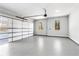 Spacious three-car garage with an automatic door and freshly epoxied floors at 1798 Braselton Hwy, Lawrenceville, GA 30043