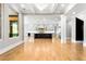 Open-concept kitchen with a large island and modern appliances with a view of the Living Room at 1798 Braselton Hwy, Lawrenceville, GA 30043