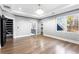Spacious main bedroom with tray ceiling, hardwood floors, and lots of natural light at 1798 Braselton Hwy, Lawrenceville, GA 30043