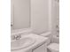 White sink with marble countertop, toilet, and shower at 8590 Secretariat Dr, Lithonia, GA 30058