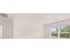 Bright bedroom features a large window offering ample natural light and scenic outdoor views at 8590 Secretariat Dr, Lithonia, GA 30058