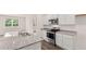 Kitchen with stainless steel appliances, granite countertops, and an island with a sink at 8590 Secretariat Dr, Lithonia, GA 30058